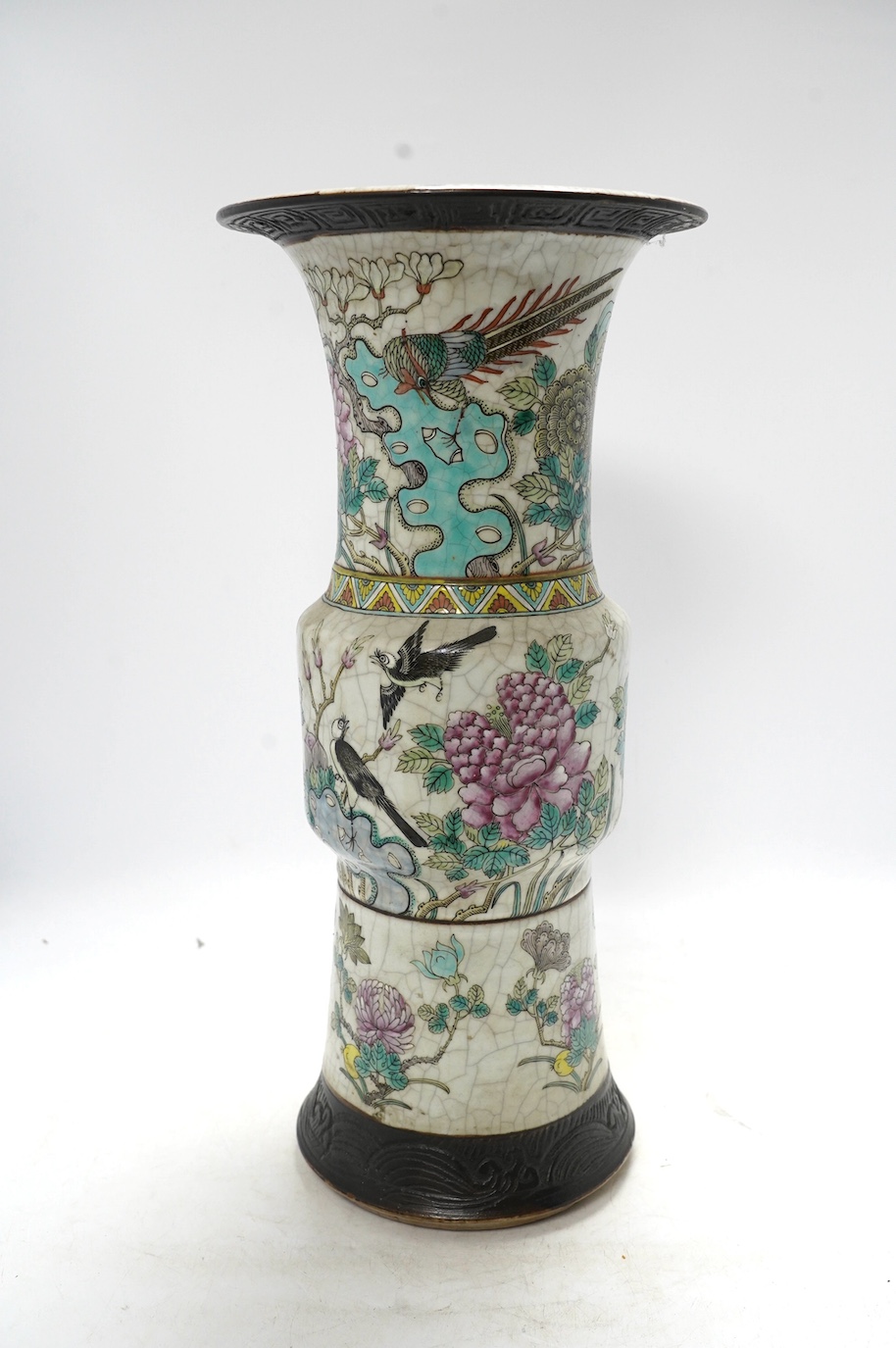 A large Chinese famille rose crackle gu vase, early 20th century, 44.5cm high. Condition - has hole to base where possibly used as a lamp, rest of lamp good